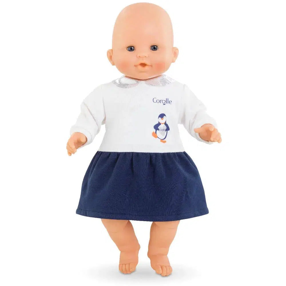 A baby doll is shown wearing the dress