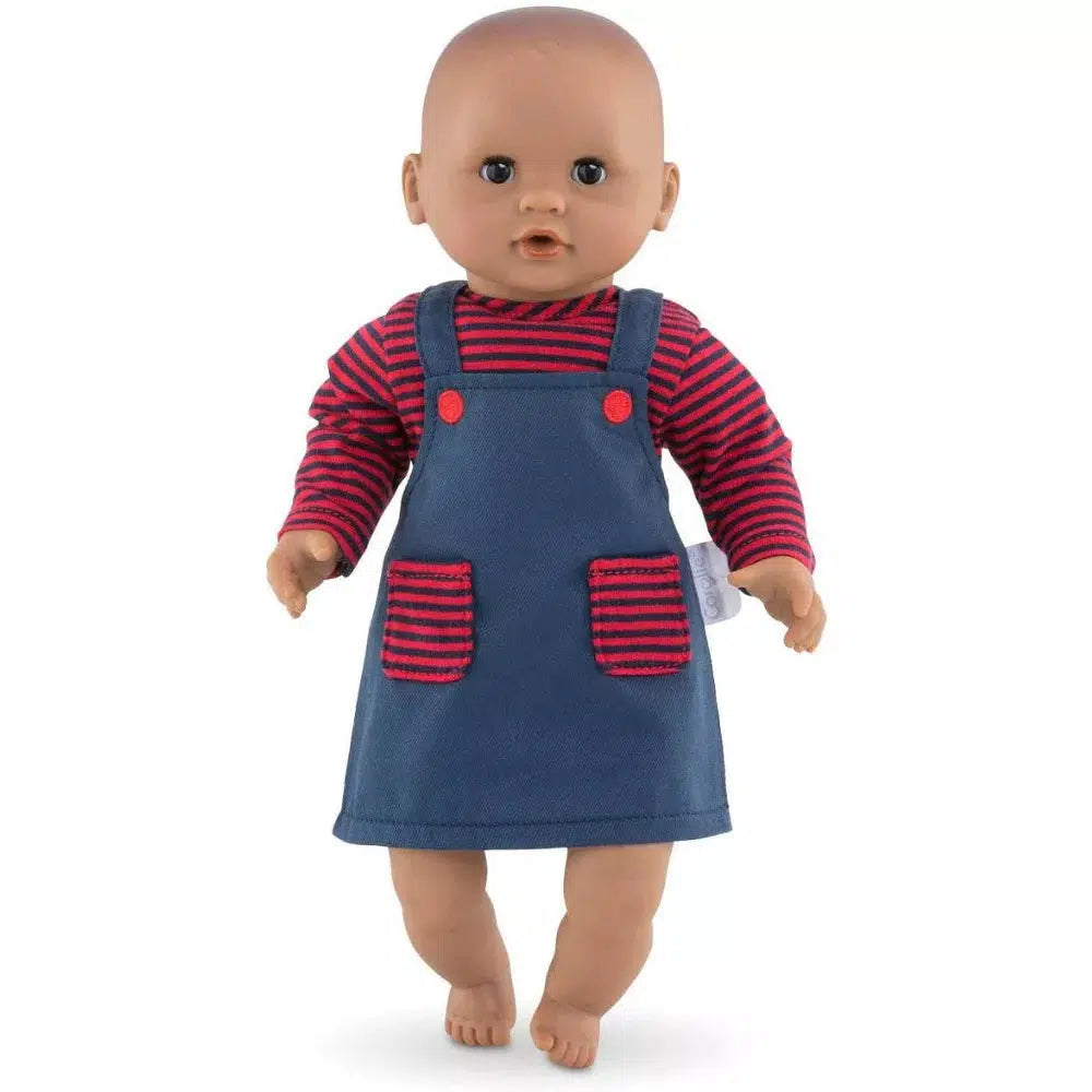 The dress is shown being worn by a baby doll
