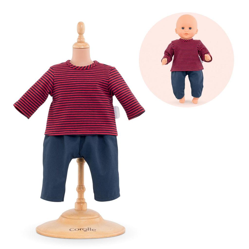 The clothes consist of a red shirt with thin frequent horizontal black stripes, and pants that are a solid navy blue.