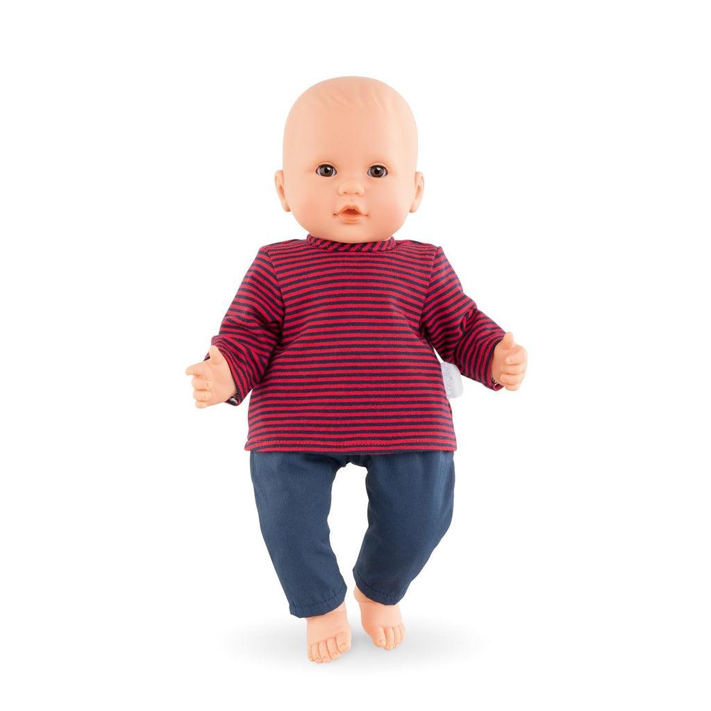 A baby doll is shown wearing the clothes