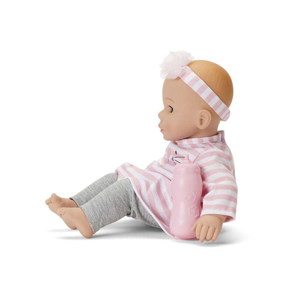 The baby doll is shown from the left side