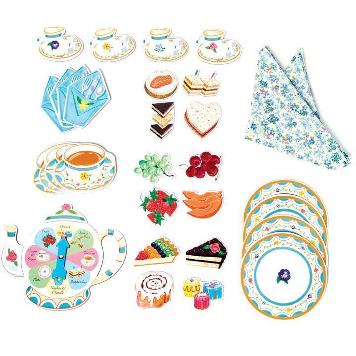 this image shows everything in the box, a tablecloth, plates, teacups, pastries, and a spinner. collect each type of food to win