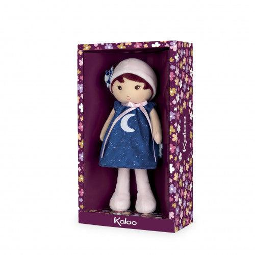 The doll comes in an open faced cardboard box with a purple background and many flowers of various colors printed on it.