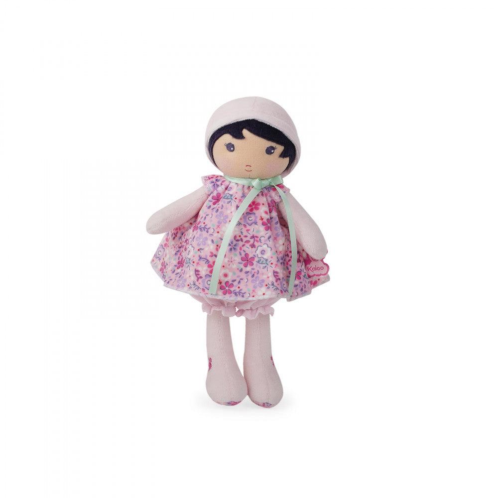 The doll is made entirely plush with details sew in like the eye's and mouth. The doll is wearing a pink floral print dress and a pink hat.