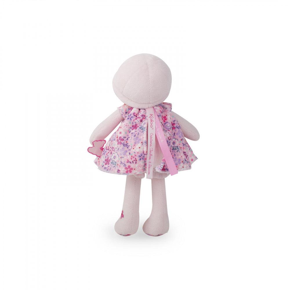 a back view of the doll. There are two ribbons coming out of the dolls neck, one with the brand written on it, and the other for writing your child's name.