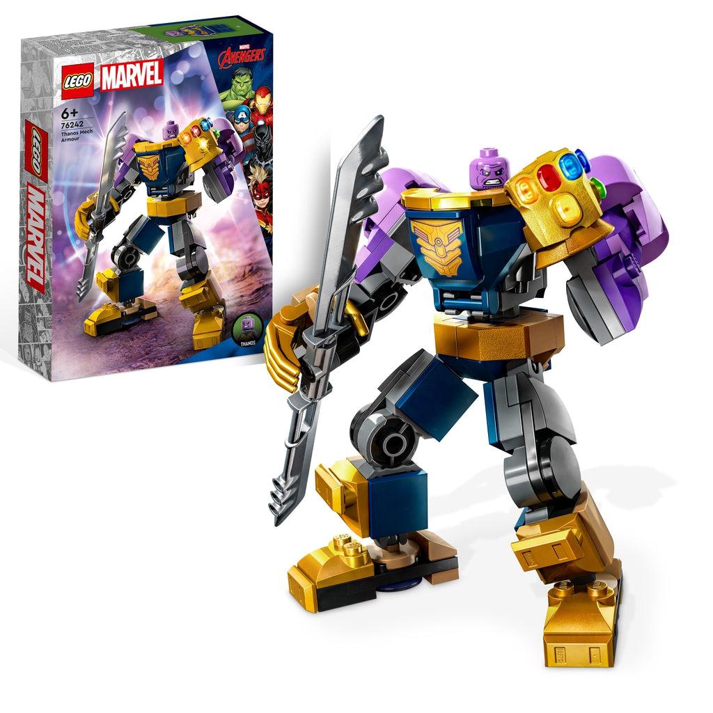 the thanos minifigure inside the mech suit is shown in front of its box. the mech is wearing the infinity gauntlet an has a double sided sword