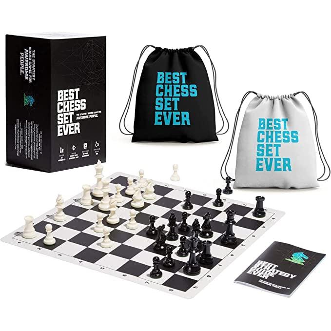 Game box and contents | 34 Triple weighted tournament style black/white chess pieces | black/white fabric storage bags with game title written in blue | reversible silicone chess board in Green/Black with algebraic notation | Chess Strategy Guide