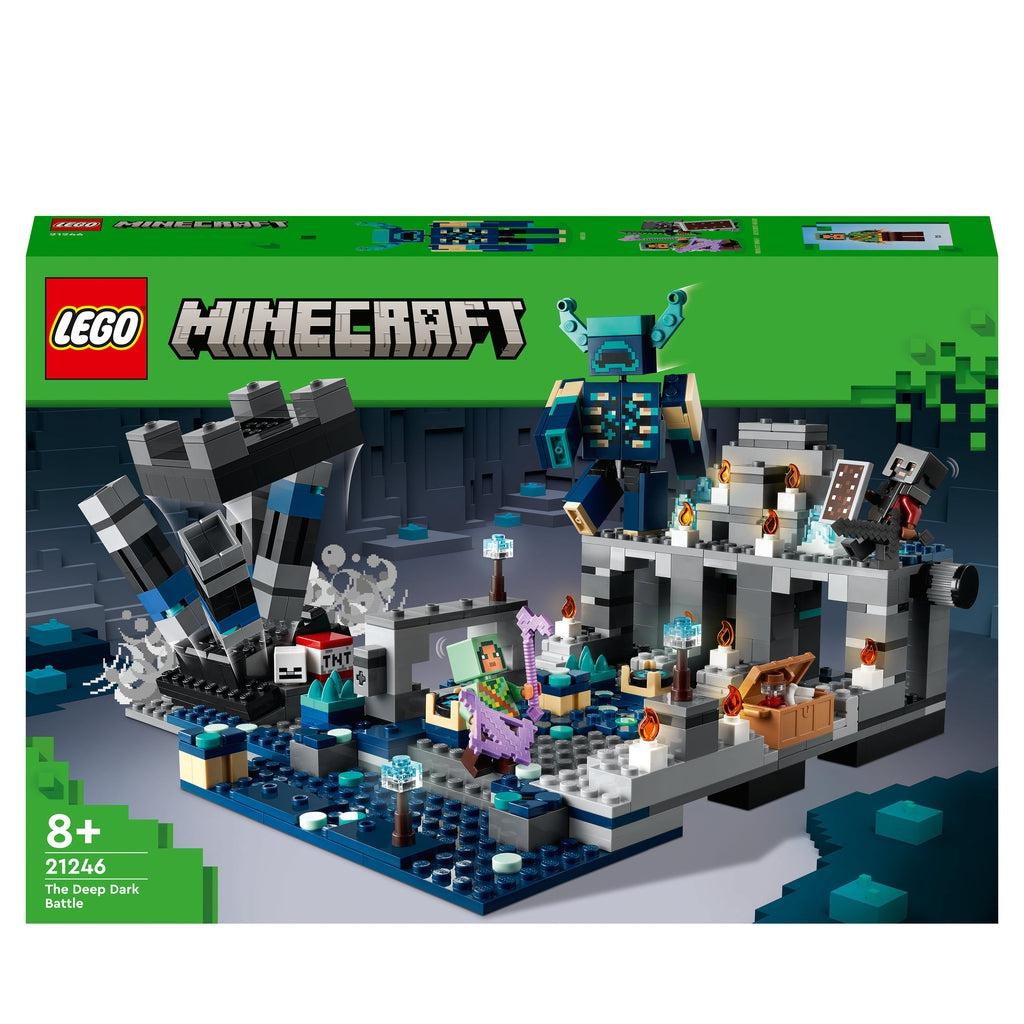 The cover of the box shows a fight scene between two minecraft characters and the new "warden" mob. The warden is a large humanoid monster twice as tall as the normal characters.
