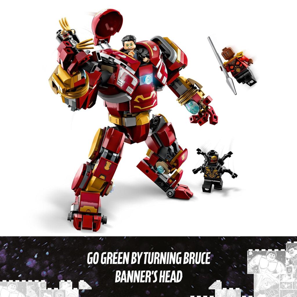 The bruce banner figure is in the hulkbuster with the head of the armor opened up, two lego minifigures jump towards it | Image reads: Go green by turning bruce banners head