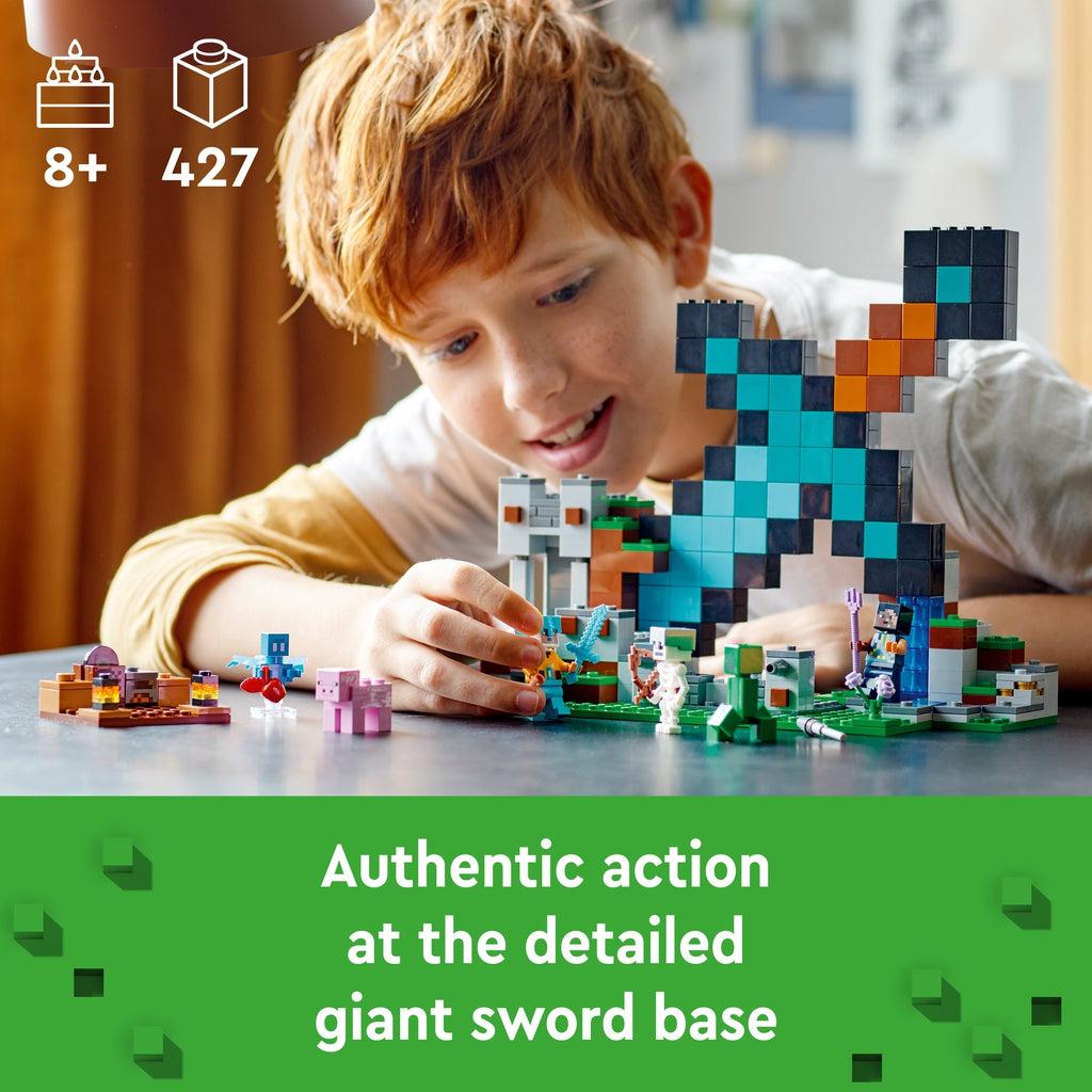 A kid is shown playing with the set and holding one of the MC characters in his hand. Image reads: Authentic action at the detailed giant sword base.