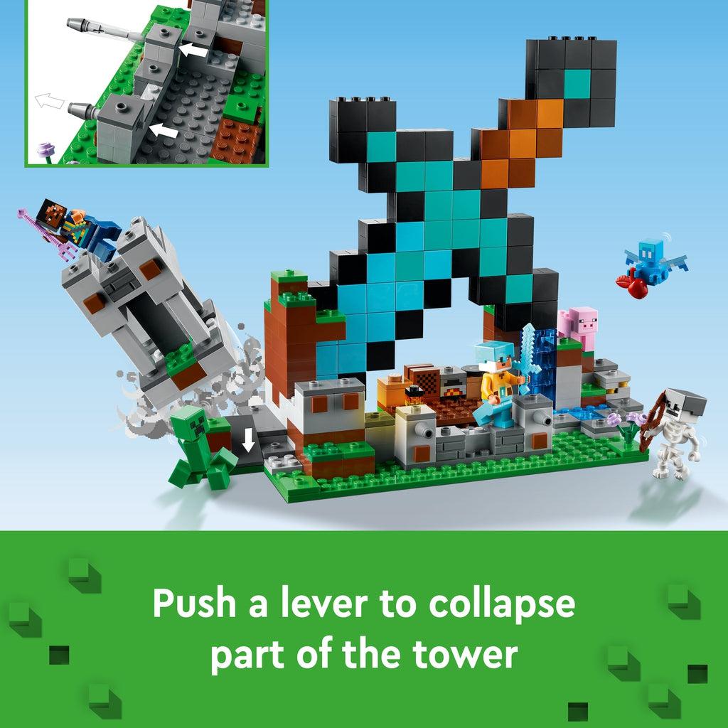 The base is shown with the tower built into the hill falling over with a character on it. Image reads: Push a lever to collapse part of the tower.