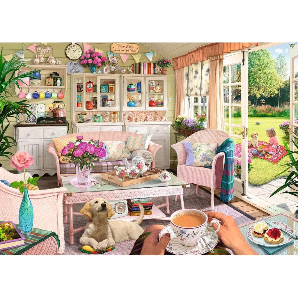 Image of puzzle | Point of view, hands hold a cup of tea while view is of a heavily decorated sitting room. A dog sits by the table and outside a child sits on a blanket with a dog