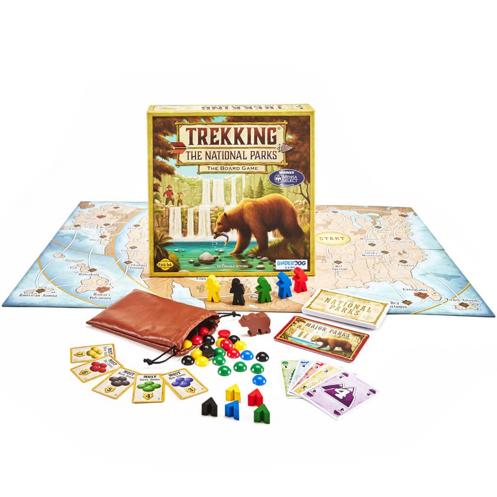 Game box with all contents surrounding it | Game pieces include wooden hikers, tents, and a bear. Game cards, and leather pouch with small round game pieces.
