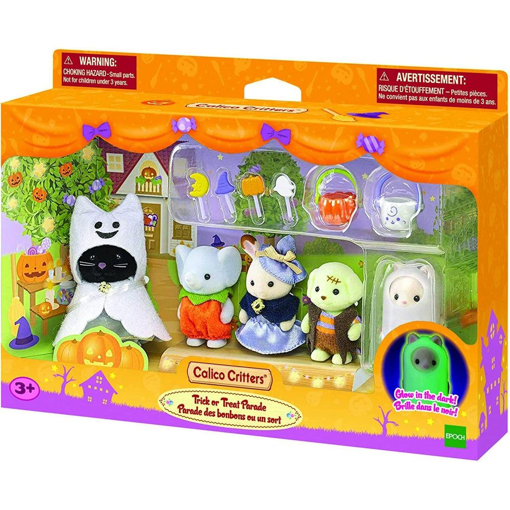 Image of the packaging for the Calico Critters Trick or Treat Parade set. The front is made of clear plastic so that you can see all the included pieces.