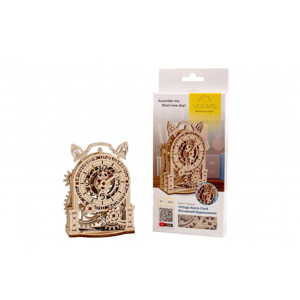 Packaging and assembled model | Packaging has an image of the model and closeup images of wooden gear pieces.