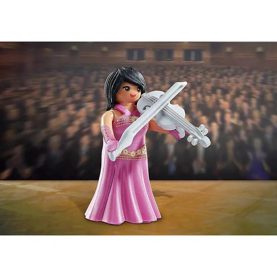 Scene of the Violinist wearing a long pink gown with gloves and holding a silver violin.