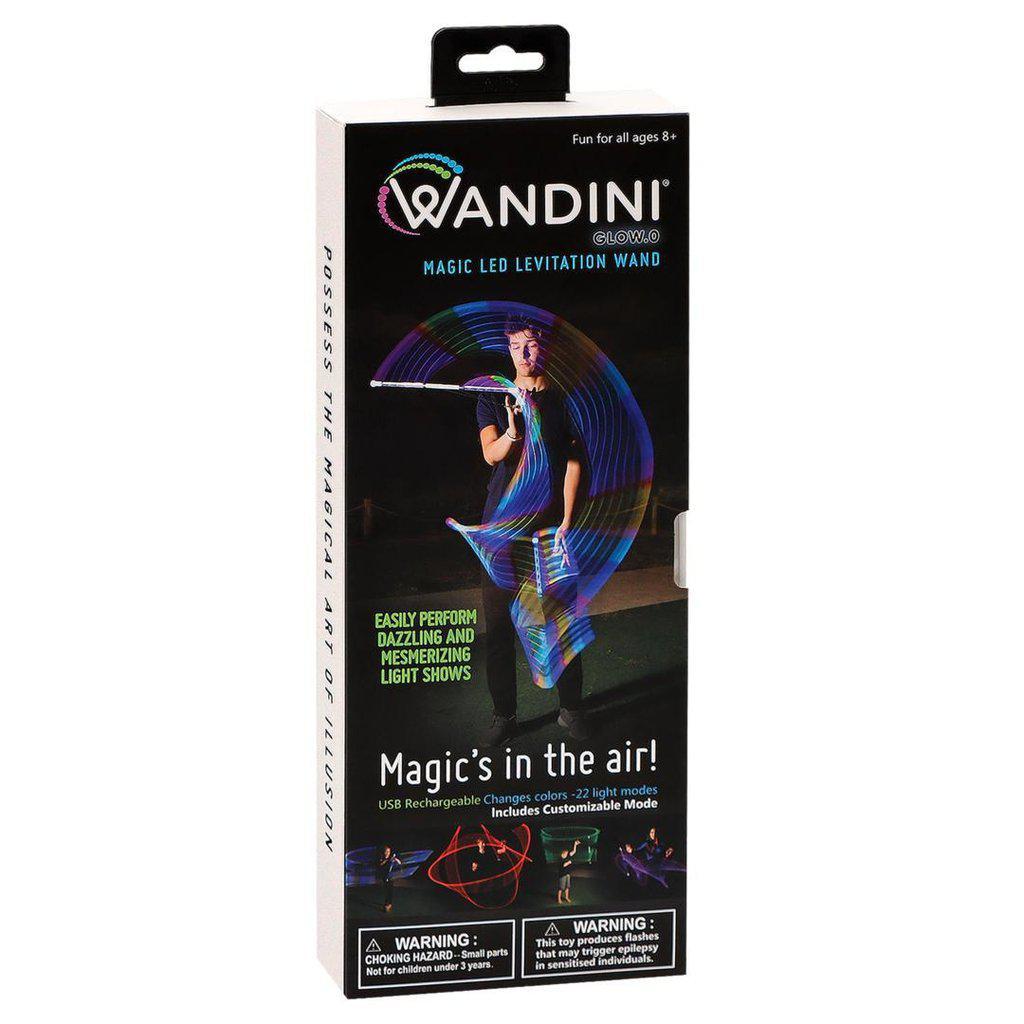 the image shows the box for wandini, a magic led levitation wand. someone is waving a blue wand around, leaving a blue arc behind the wand.