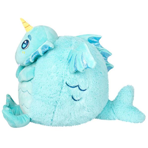 Side view of the plush. Shows that there are dark blue emboidered gills on its side.