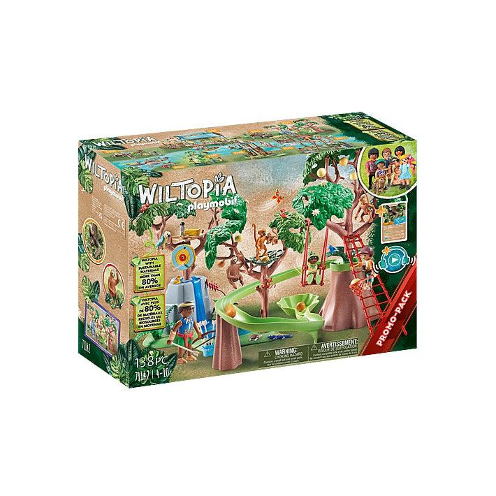the front of the box shows the playset, there is a tree with a marble track down from it and a swing, there is also a rock with a fake waterfall with two trees near it