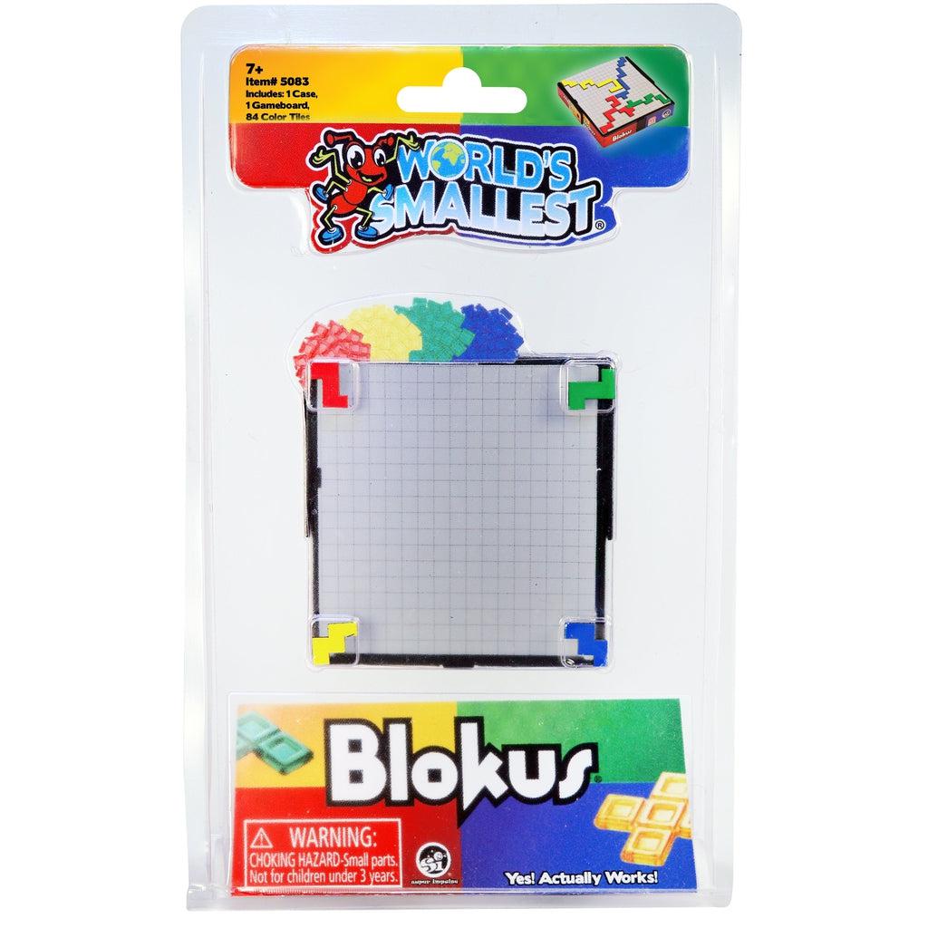 Image of the packaging for the World's Smallest Blokus. The packaging is clear plastic so that you can see the game board and colorful game pieces. The four colors included are red, yellow, green, and blue.