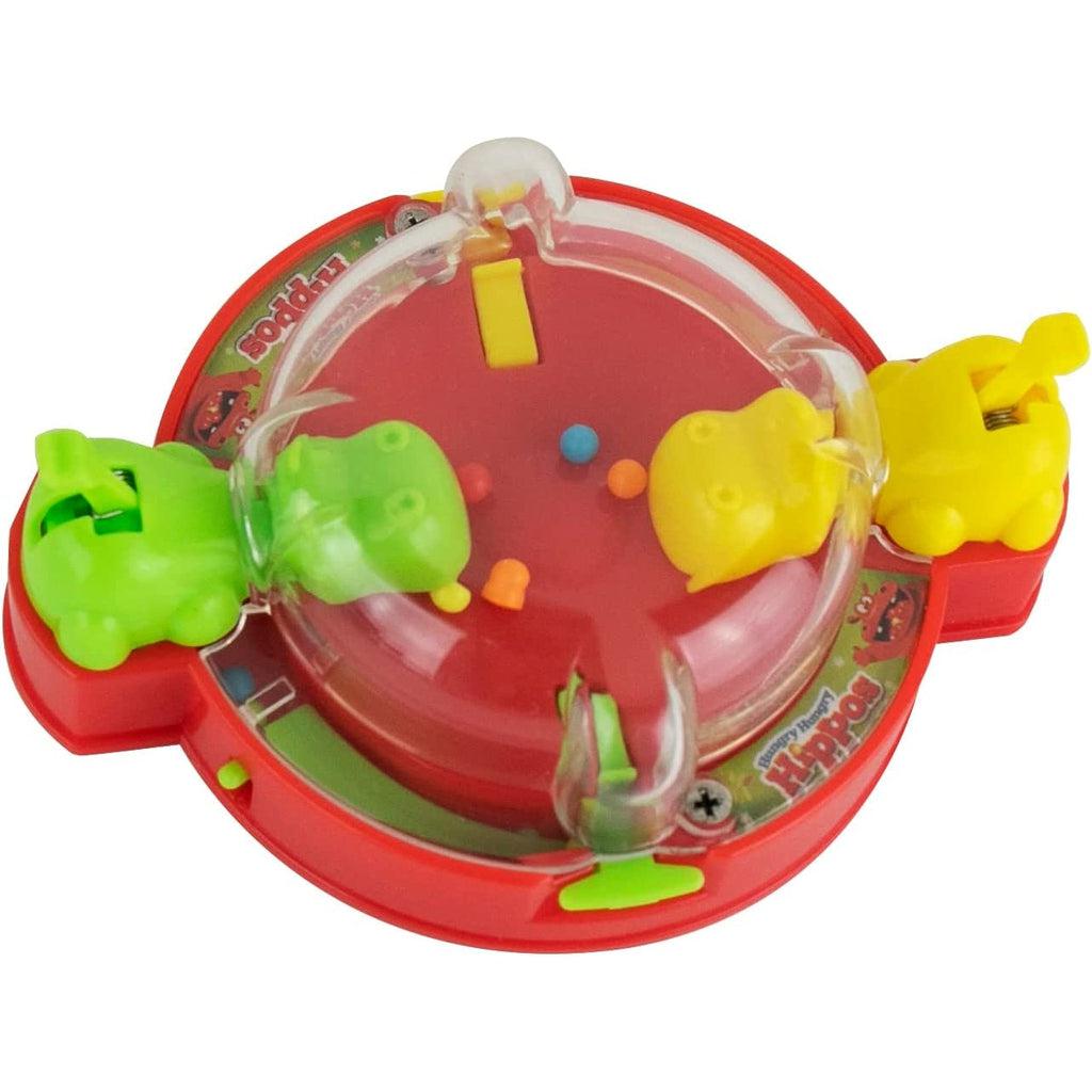 Close up shot of the game. There are only two hippos and they are lime and yellow colored. The balls are multicolored, and the entire game is encased in thick clear plastic.